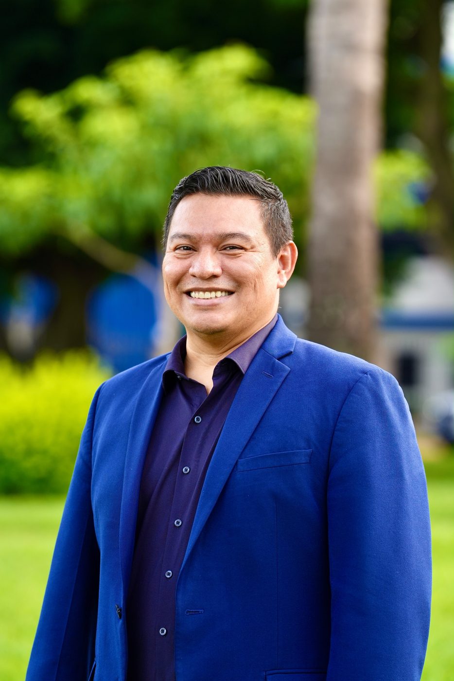 Orlando Delcid — retrato cercano, sonrisa amplia
